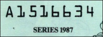 Sample image of a serial number on the 1987 Disney Dollar
