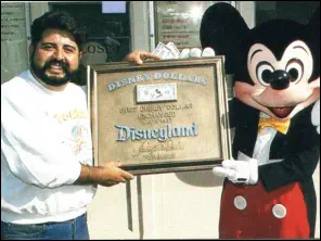 Dale Castillo receives the first publicly circulated Disney Dollar, 1987